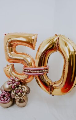 Feliz 50 oro